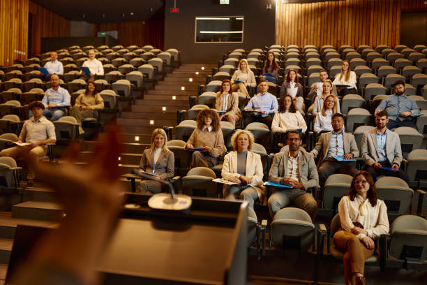 istock Business people attending a seminar in convention center. 2093318164