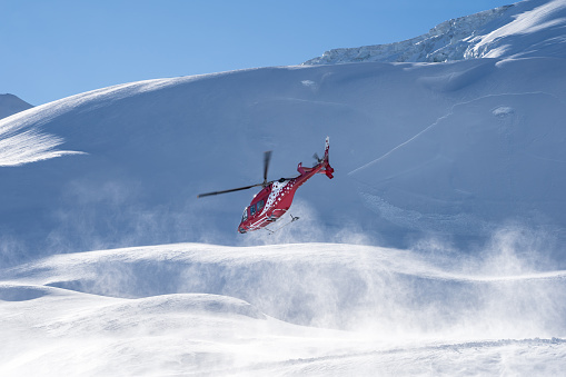 Mountain red rescue Helicopter in Switzerland