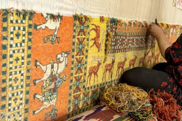 istock a old way of making carpet 2093387862