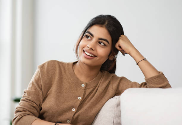 istock Relaxed young woman resting at home 2093419755
