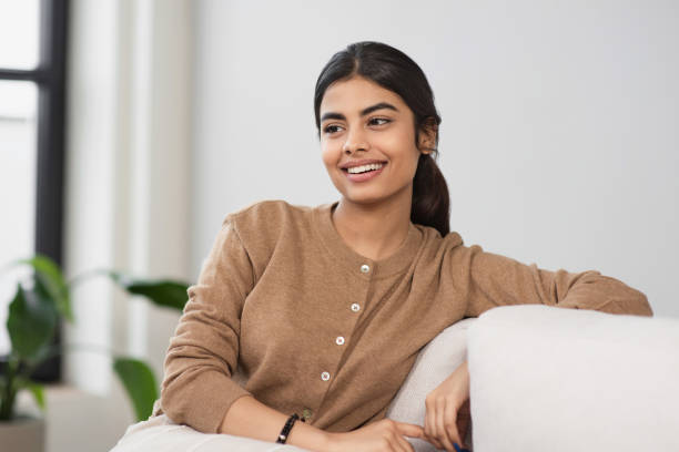 istock Relaxed young woman resting at home 2093422890