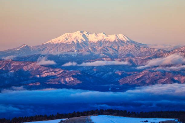 Mt. Ontake at sunrise covered in snow in Japan Mt. Ontake at sunrise covered in snow in Japan mt ontake stock pictures, royalty-free photos & images