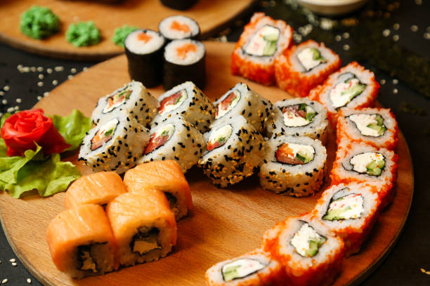 istock Wooden Plate With Sushi and Vegetables 2093492617