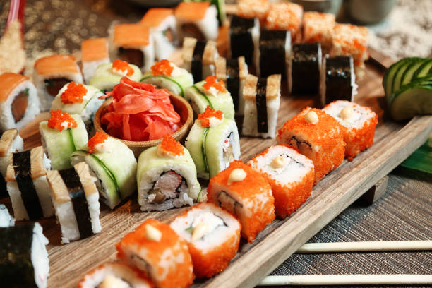 istock Assorted Sushi Types on Wooden Tray 2093497249