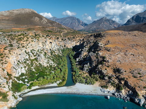 Famous Preveli gorge with river and palm tree forest (South Chania, Crete, Greece).