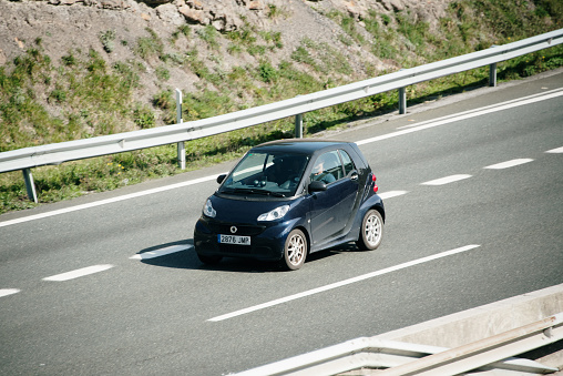 Saltacaballo, Spain - 15 March 2024: A Smart forTwo car on a highway