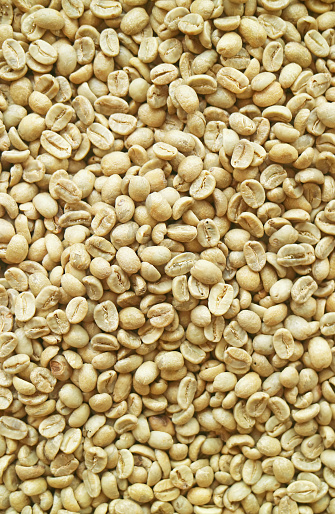 Top view of heap of parchment coffee beans