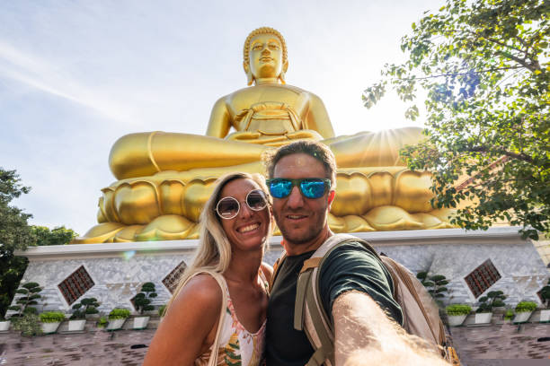 They smile at the camera, happy to discover the gems in Asia