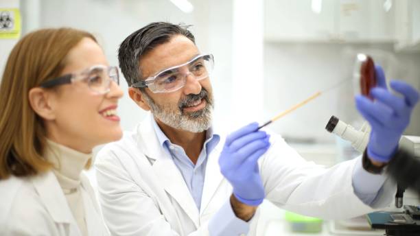 istock Scientists examining a blood sample together in a clinical laboratory setting. 2093545409