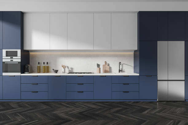 istock Blue modern kitchen interior with cooking cabinet and kitchenware, wooden floor 2093662340
