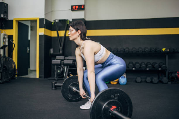 istock Strong woman weightlifting 2093668629