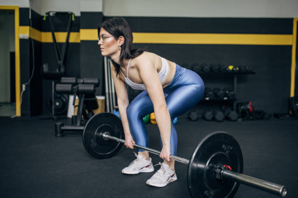 istock Strong woman weightlifting 2093669669
