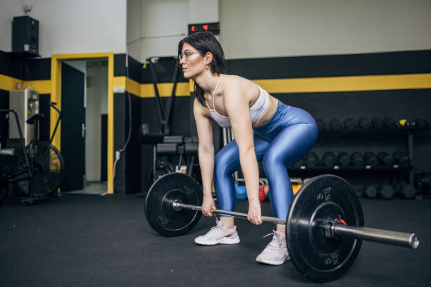 istock Strong woman weightlifting 2093670183