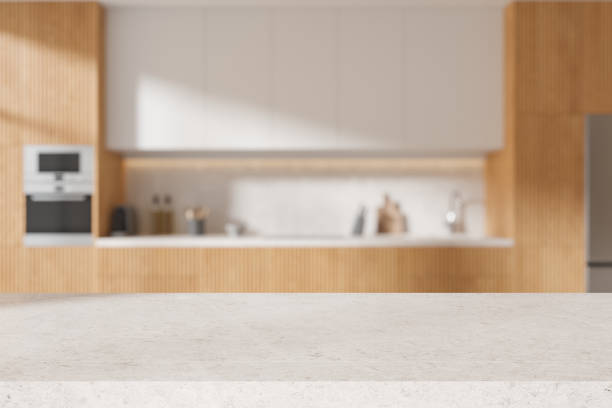 istock Quartz countertop on background of kitchen interior with kitchenware. Mockup 2093671772