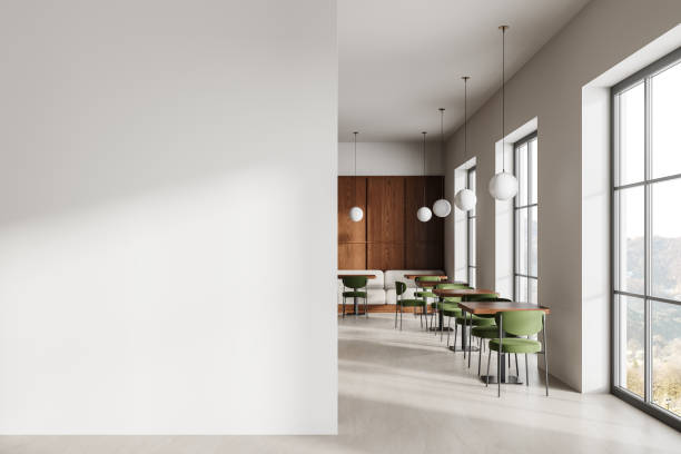 istock Cafeteria interior with tables in row, eating area with window. Mock up wall 2093700306