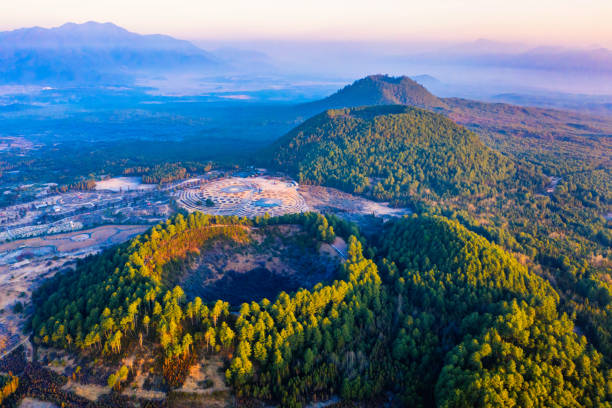 A scenic aerial view of Popocatepetl, a second highest peak in Mexico. It is an active stratovolcano, located in the states of Puebla, Morelos and Mexico, in central Mexico.