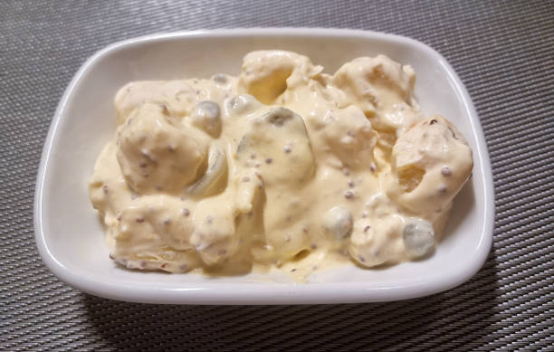 Tender potato salad with mastard, mayonnaise and yogurt