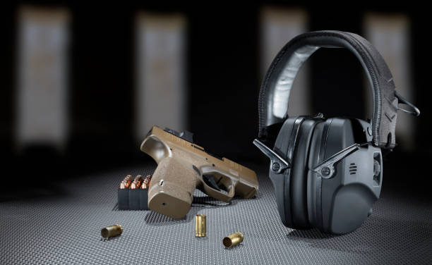 istock Pitol and  ammo with hearing protection 2093717454