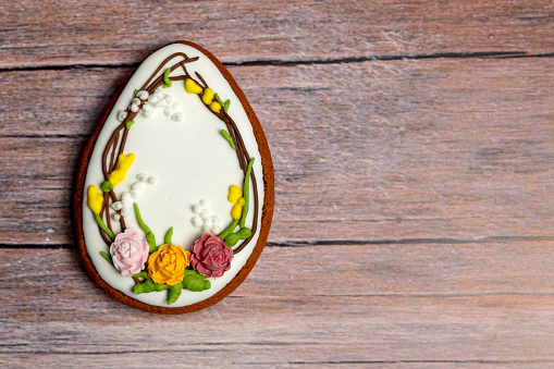 Easter gingerbread cookie on  wooden table. Cookies for Easter