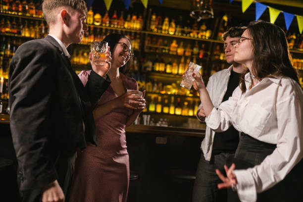 istock Women talk with young strangers at bar counter in pub 2093804875