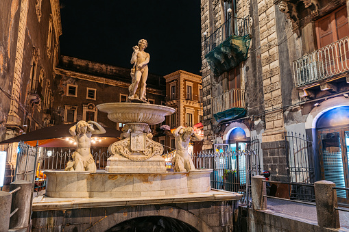 Fontana Dell'Amenano in the Sicilian city of Catania, Italy at night.