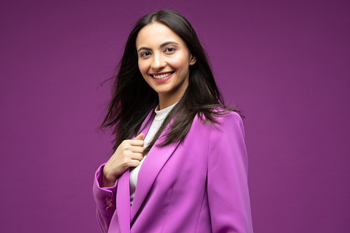 Portrait of her she nice well-dressed attractive lovely luxury pretty content cheerful girl isolated purple background