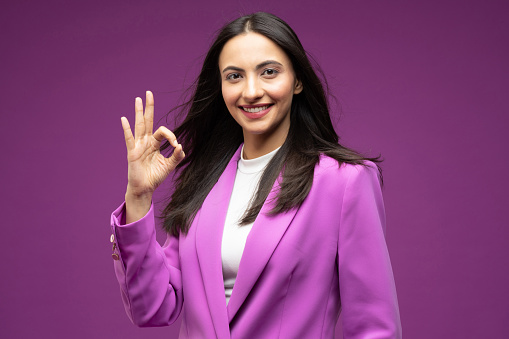 Portrait of her she nice well-dressed attractive lovely luxury pretty content cheerful girl isolated purple background