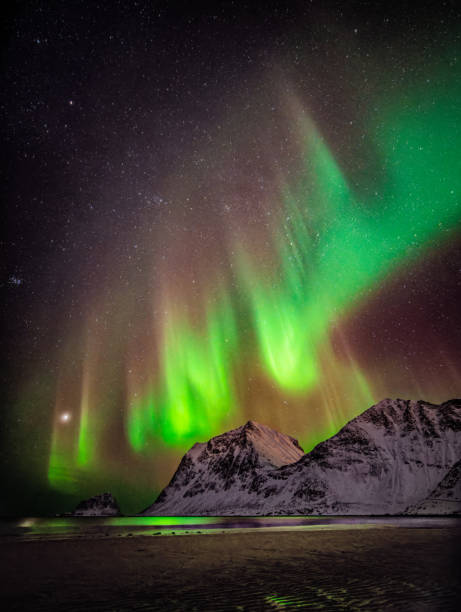 istock Northern lights aurora on Lofoten, Norway 2093868570