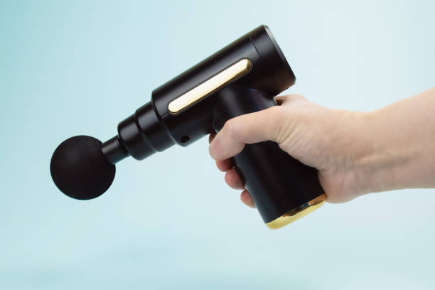 istock Portable Therapy Massage Gun. Percussion massager 2093872816