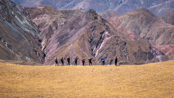 istock Group of people walking in the mountains. Backpackers. 2093890488