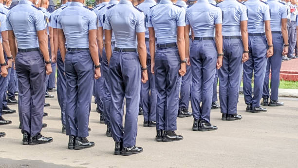 Rear view of Cadets in uniform are in ranks