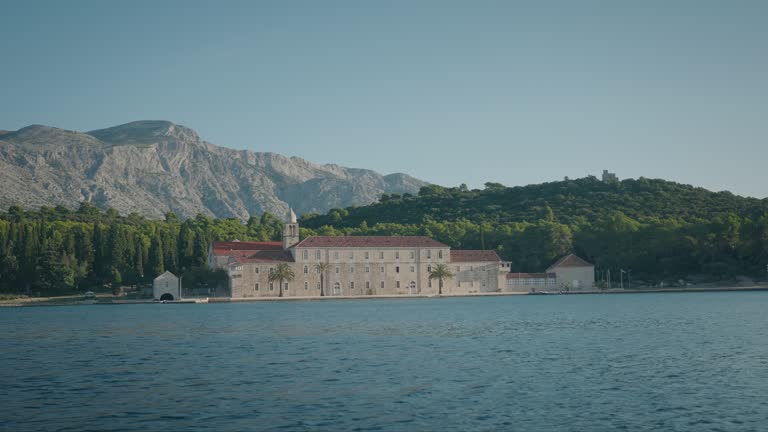 Mediterranean architecture of Franciscan monastery. Badija island, Korcula. Travelling in summer.