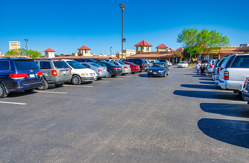 San Marcos, Texas - March 15, 2008: Premier Outlet with parking full of cars.