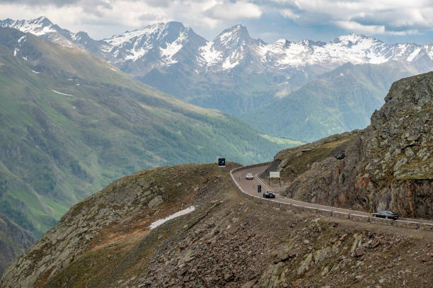 porsche 911 and 928 sports cars driving on an alpine road in the mountains - ferrari italian culture porsche porsche 911 ストックフォトと画像