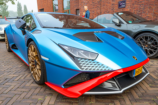 Lamborghini Huracán STO sports car parked on a street in Zwolle, Netherlands. The STO is a high performance edition of the Lambo Huracan with extreme aerodynamics, track-honed handling dynamics, lightweight contents and a high performing V10 engine.