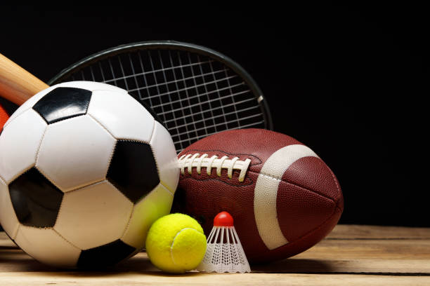 istock Various sports equipment on black background studio shot 2094005580