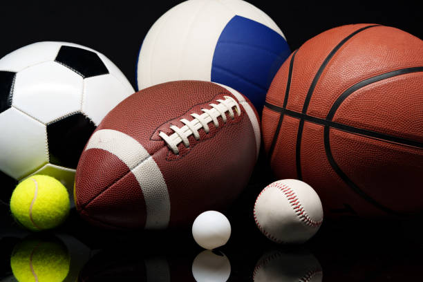istock Various sports equipment on black background studio shot 2094005602