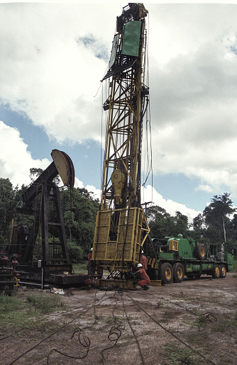 Drilling of an onshore oil well at dusk. Bahia, Brazil.