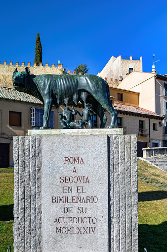 Segovia, Spain - March 5, 2024: Roman statue of an animal feeding its puppies. It honors the 2000 anniversary of the city medieval aqueduct.
