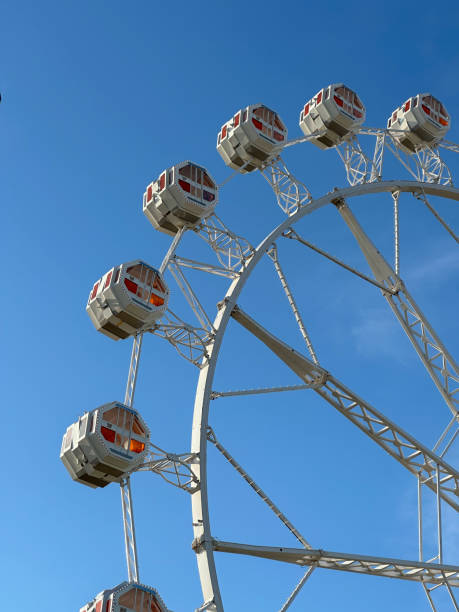 istock View of a ferris wheel with a clear blue sky 2094066092