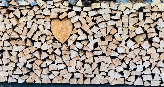 Fireplace wooden stack with an integrated wooden heart