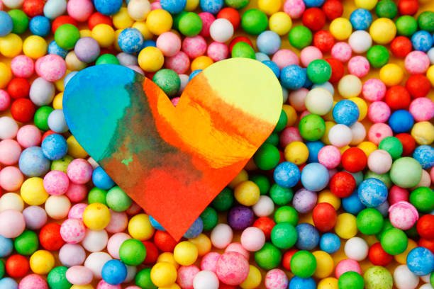 Colorful heart on many different colored spheres