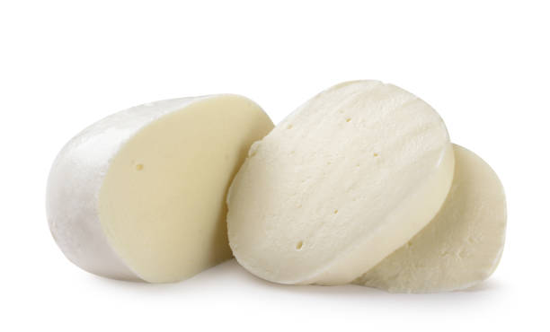 istock Mozzarella and two pieces close-up on a white. Isolated 2094107149