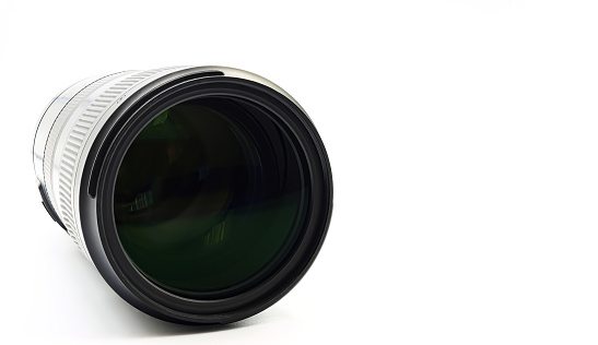 Close-up of a photographic camera lens. Large copyspace