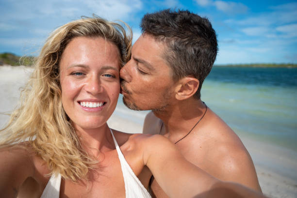 istock Couple in love having fun in beach in Brazil 2094132964