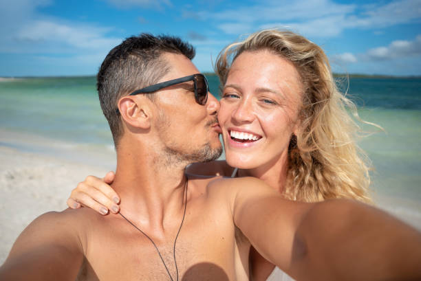 Man kissing his woman