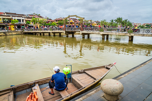 Hoi An, Vietnam, November 20, 2022: View of Thu Bon River running through the historic town of Hoi An, Vietnam