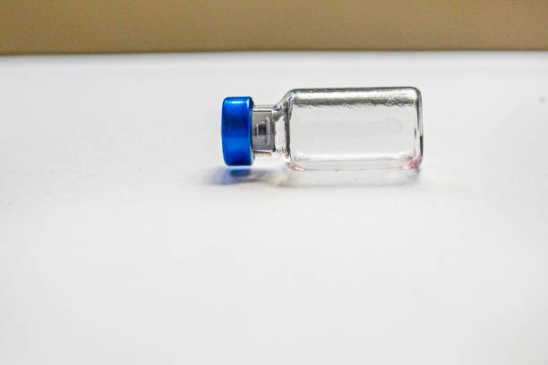 empty bottle with medicines for treatment and vaccinations on a white background. Routine vaccinations for animals and people