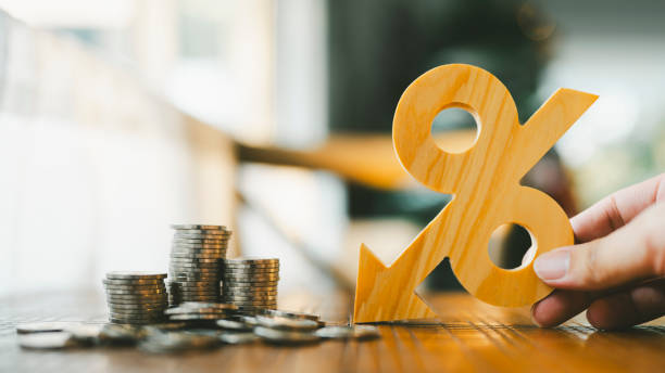 istock Percentage model with coins stack. Concepts of the banking system, rising interest rates, inflation, deflation, and savings. 2094194234