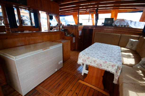 istock Wooden yacht deck with dining table 2094196348
